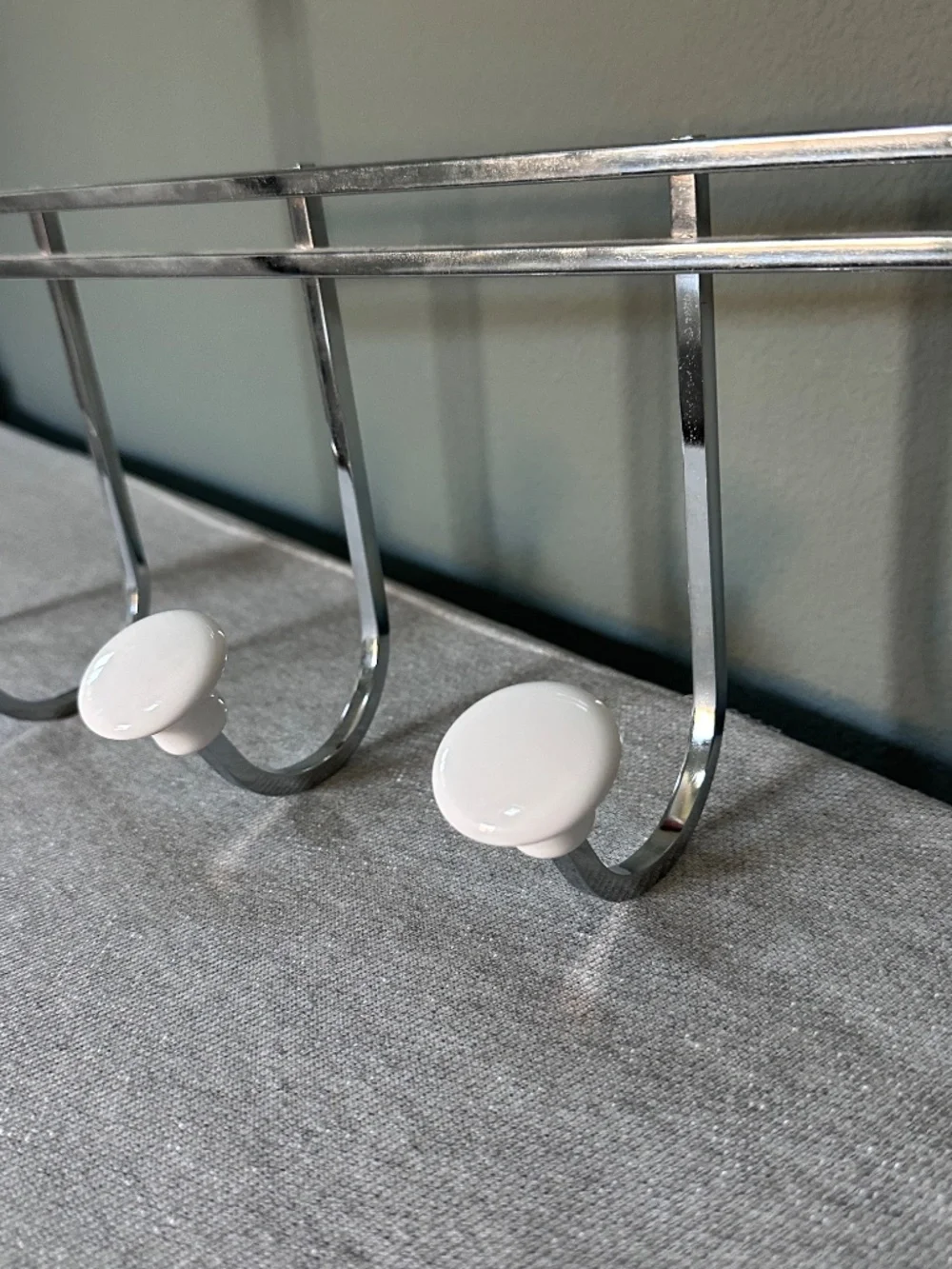 Container Store: Chrome 5-Hook Over-the-Door Rack with White Ceramic Knobs